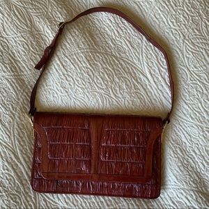 Expandable burgundy vintage shoulder bag
